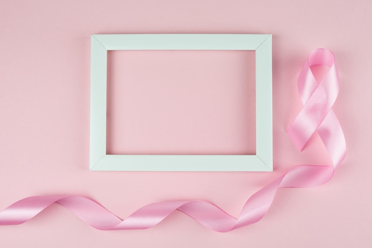 World Breast Cancer Day Pink ribbon white frame on pink background