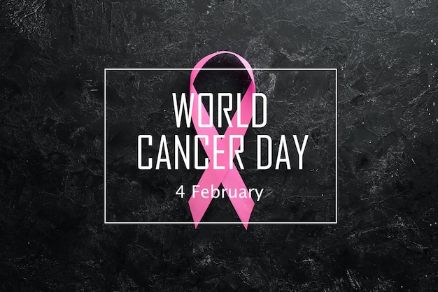 Photo world cancer day breast cancer awareness ribbon top view free copy space