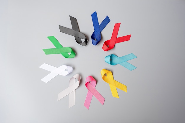 Photo world cancer day. colorful awareness ribbons