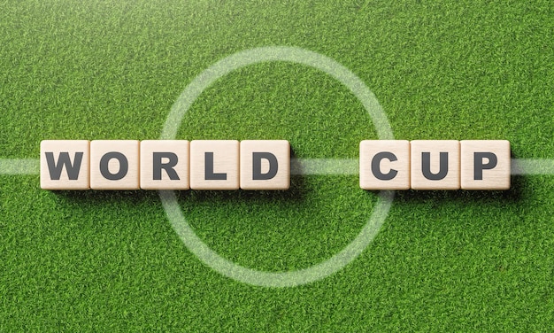 World cup word alphabet on wooden block cube in soccer field with center line Sport and tournament concept 3D illustration rendering