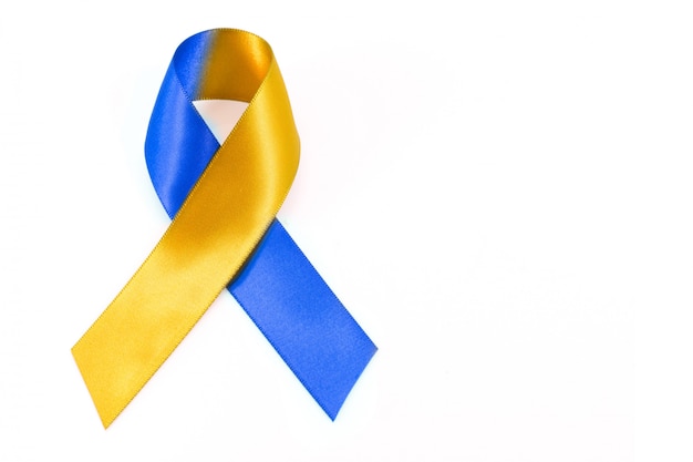 World down syndrome day with blue yellow awareness ribbon bow.