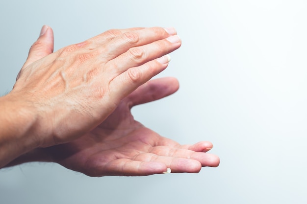 World encouragement campaign "#ClapForOurCareres" to Medical team fight with Covidvirus.Closeup male hand applause with doctor and nurse overlay.