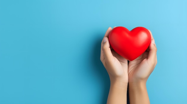 World Heart Day Concept with Hands Holding Red Heart