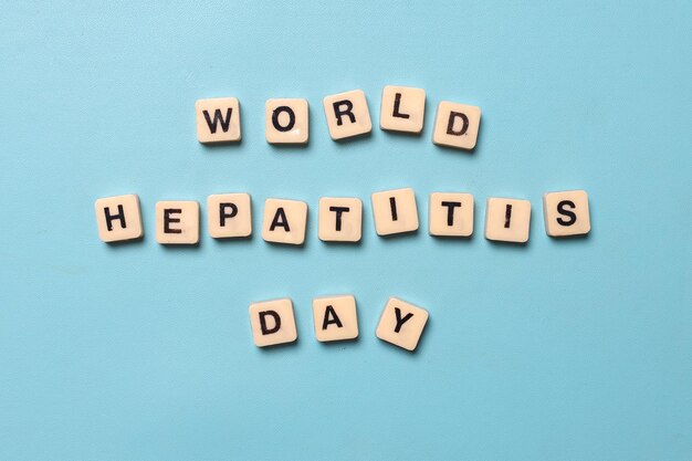 Photo world hepatitis day on a blue background