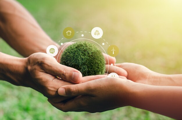 The world is in the hands of helping each other. in the concept of environmental conservation environmental protection Elements Of This Image Decoration Environmental Icons