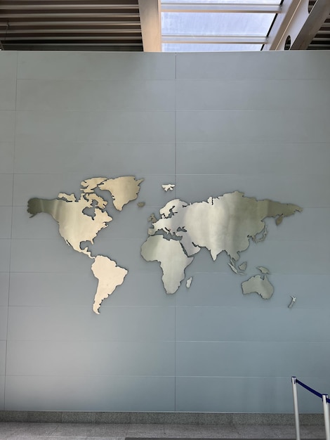 World map image at the airport on the wall