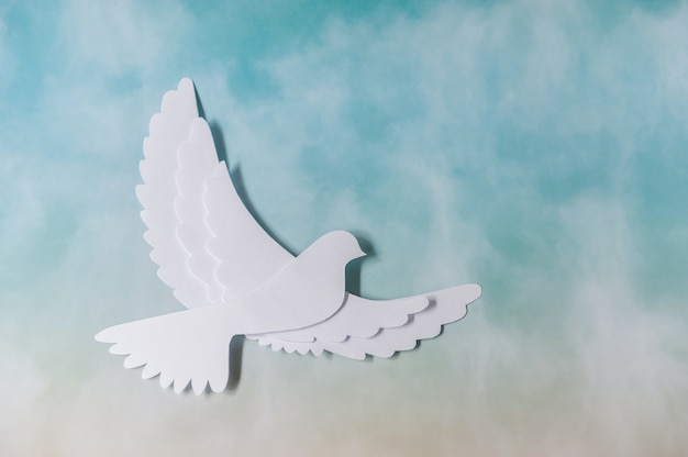 World peace day greeting card. white dove flying.\
minimalism