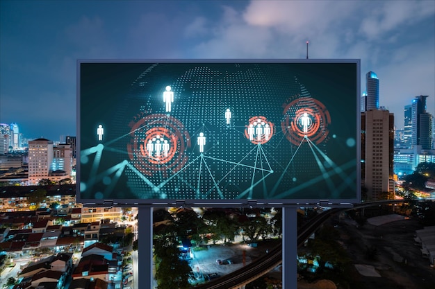 World planet earth map hologram and social media icons on\
billboard over night panoramic city view of kuala lumpur malaysia\
asia networking and establishing new connections between people\
globe