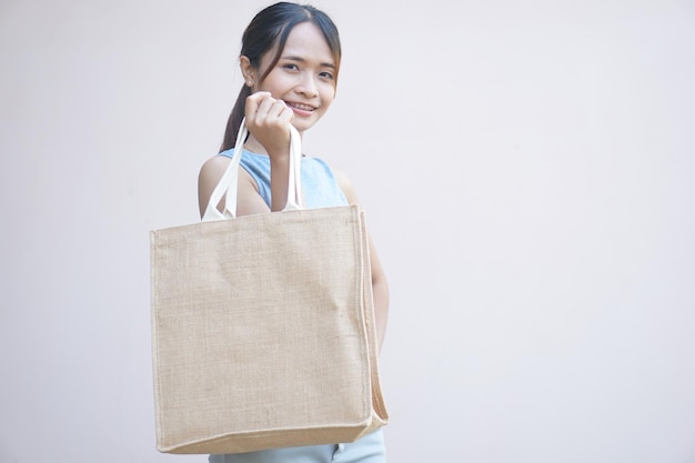 World plastic free day Women use cloth bags instead of plastic bags for shopping