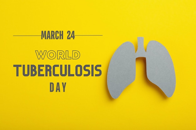 world tuberculosis day paper lungs on a yellow background with text