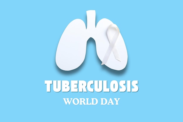 world tuberculosis day white paper lungs and ribbon on a blue background with text