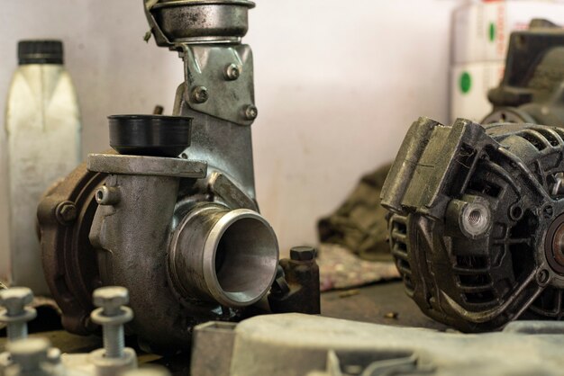 Worn turbine and alternator in a workshop bench