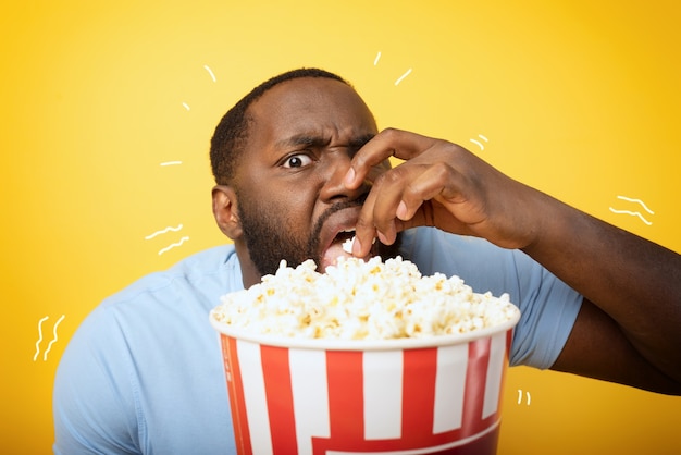 Worried boy watches a horror film. concept of entertainment and streaming tv