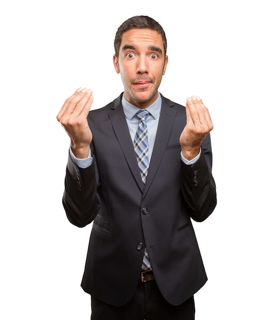 Worried businessman doing a puzzled gesture