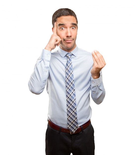 Worried businessman doing a puzzled gesture