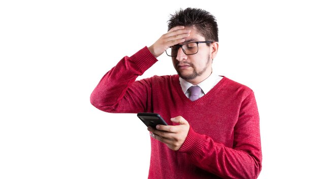 Worried latin man watching cell phone with red jacket businessman or entrepreneur