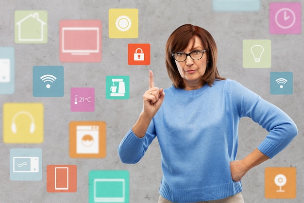 Photo worried senior woman pointing to lock icon