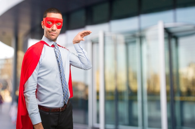 Photo worried super businessman hold gesture