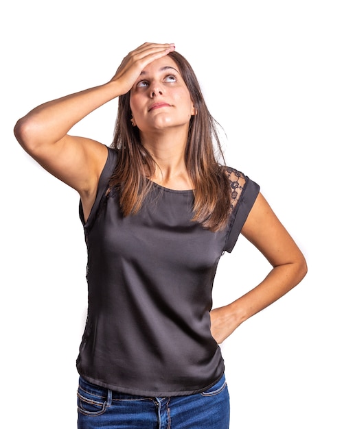 Worried and surprise young woman on white background