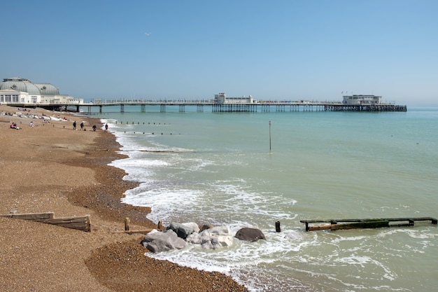 WORTHING, WEST SUSSEX/UK - APRIL 20 : View of Worthing Pier in West Sussex on April 20, 2018. Unidentified people