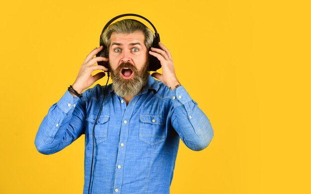 Wow his favorite song enjoy excellent sound song in earphones good mood playlist Man with headset copy space bearded man hipster in headset listen audio book Music beat for energetic mood