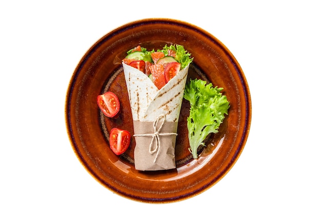 Wrap roll sandwich with fish salmon and vegetables Isolated on white background