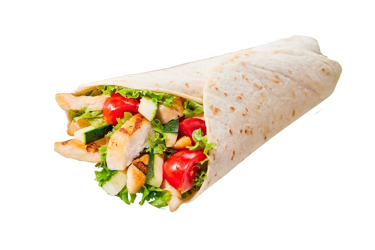 Photo a wrap with chicken, cucumber, tomatoes, cucumber, and cucumber.