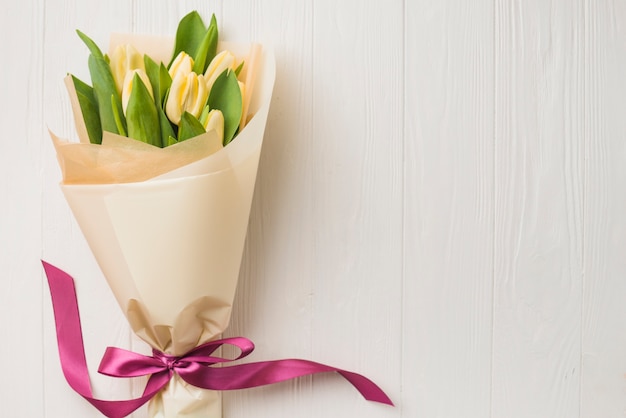 Wrapped bouquet of tulips