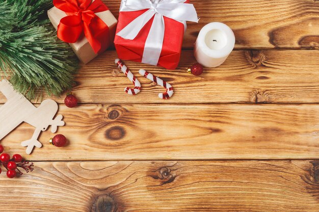 Wrapped christmas gift boxes with ribbons on table