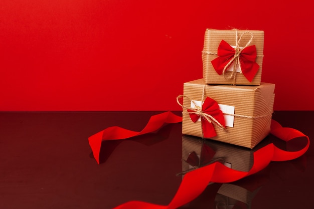 Wrapped gift boxes for Christmas on red