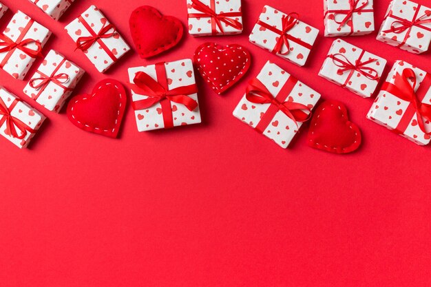 wrapped gift boxes with ribbons and textile hearts