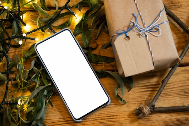 Photo wrapped gift and copy space smartphone