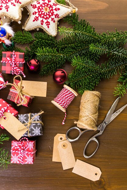 Wrapping assorted chocolates in small boxes for Christmas presents.