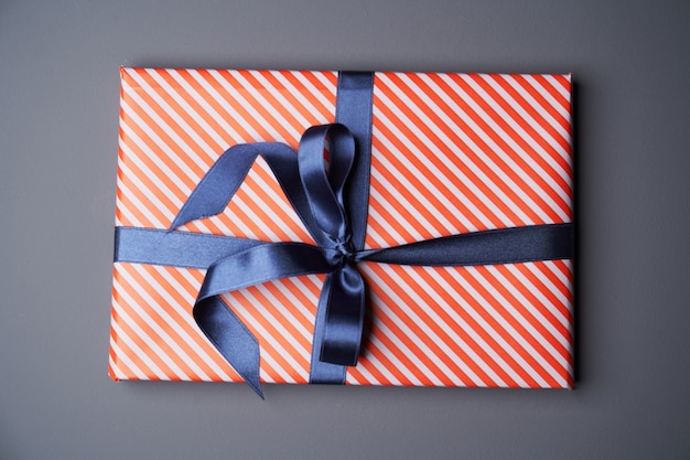 Wrapping colorful gift box on gray color