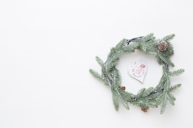 Wreath decoration on white wooden