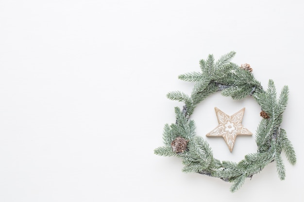 Wreath decoration on white wooden