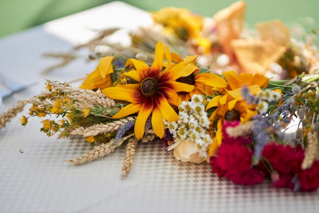 wreath of delicate variety of wildflowers closeup