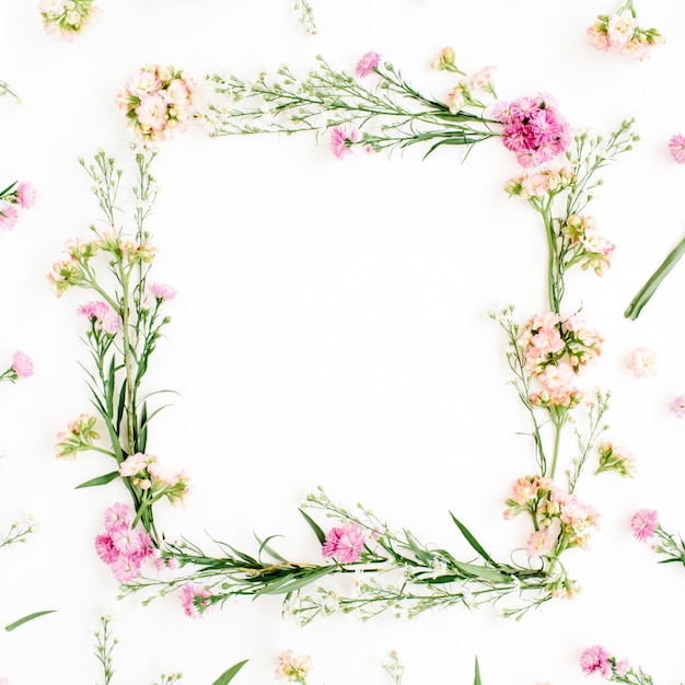 Wreath frame made of pink and beige wildflowers design