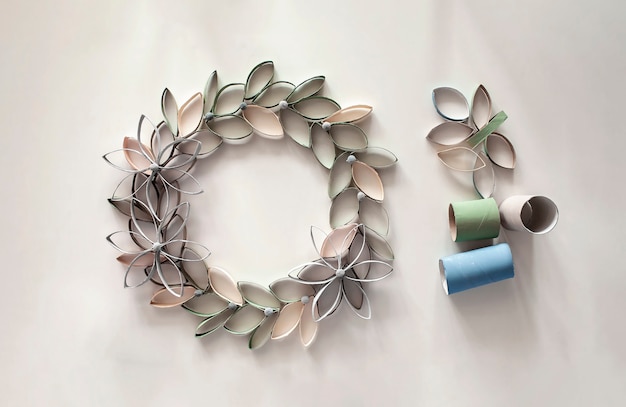 Wreath from toilet roll tube for Easter celebration, zero waste craft for kids, neutral pastel