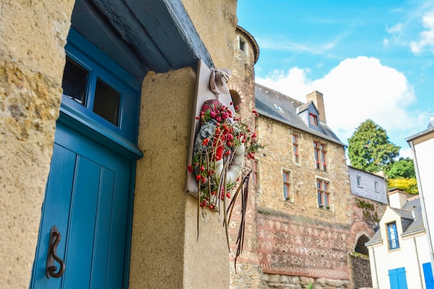 Wreath with red berries on a door