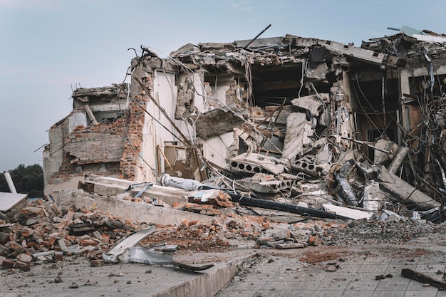 Wreckage of a destroyed building Ruins in the background