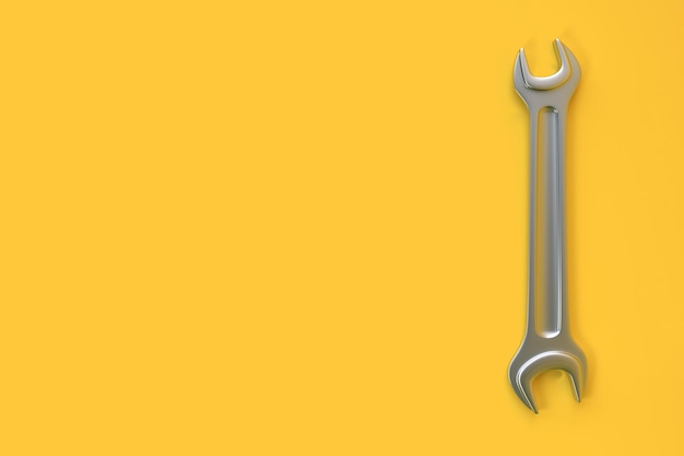 Wrench on yellow background Top view with copy space Minimal creative concept 3D render illustration