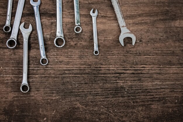 Wrenches on wooden table