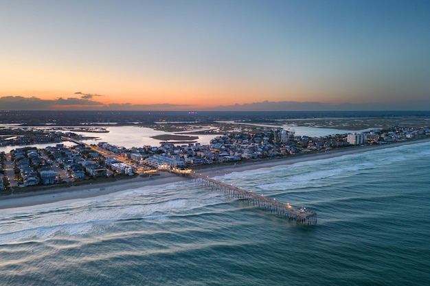 Photo wrightsville beach north carolina over the coast at dusk