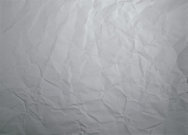 Сморщенная и скомканная бумага Текстурированный фон Белая бумага Оттенки серого