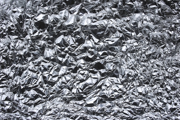 Wrinkled foil silver background texture