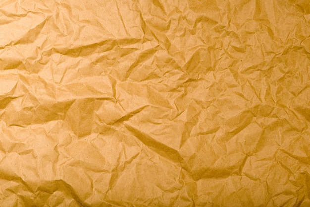 Wrinkled Kraft Paper Texture. Natural Brown Vintage Background - image