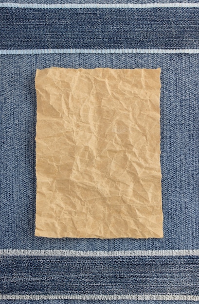 Wrinkled parcel paper at jeans texture