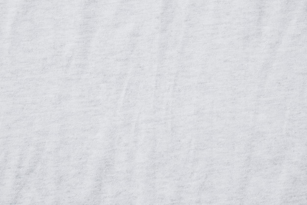 Wrinkled white cotton polyester, fabric texture background.