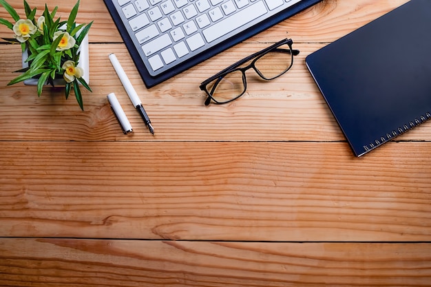 writing elements on wooden desk